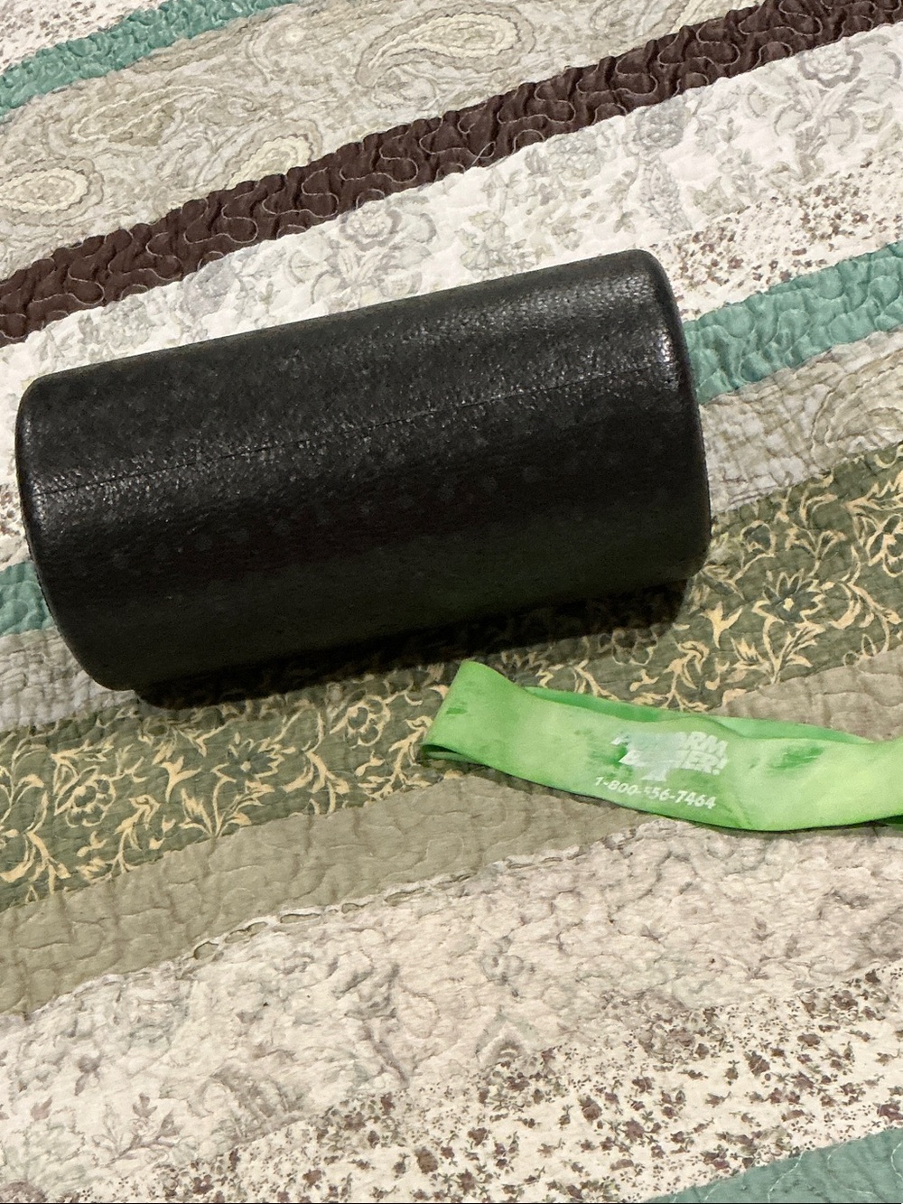 Black Foam Roller with Green Resistance Band